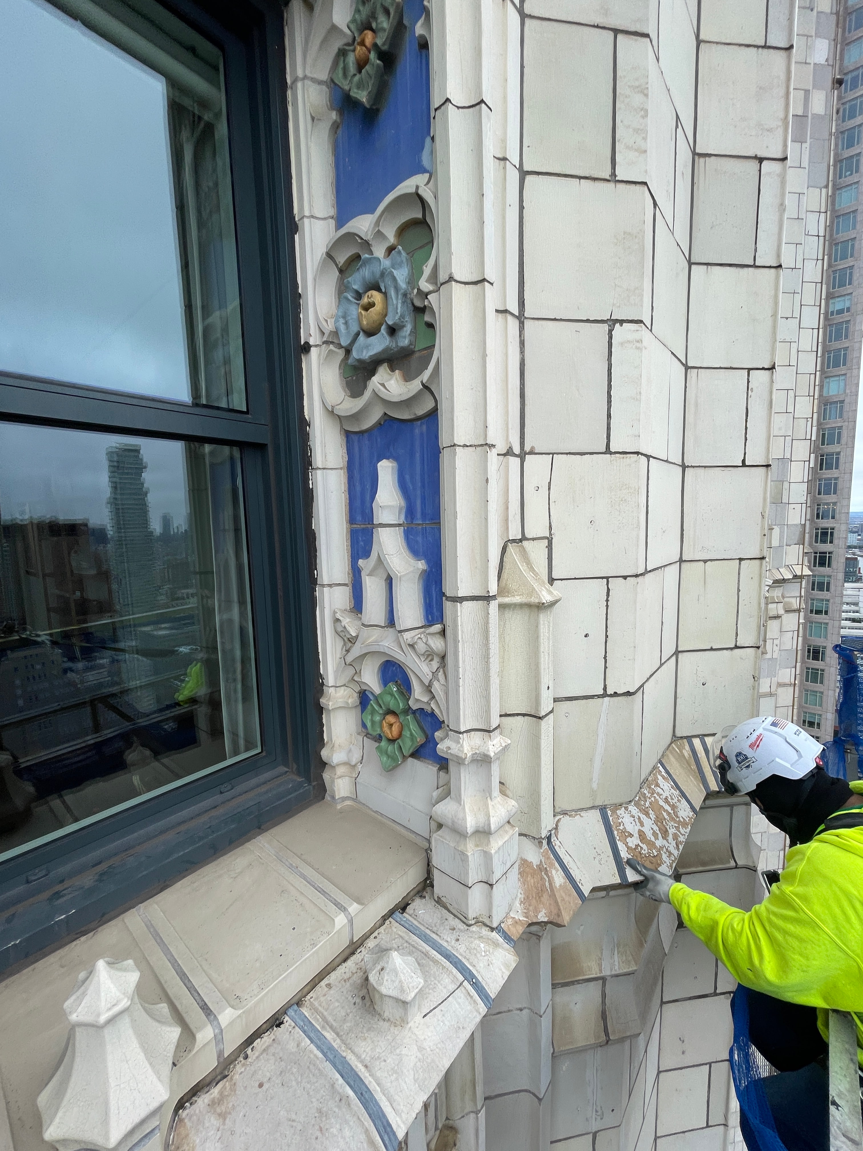 Close-range work at the Woolworth Building's terra cotta window surround