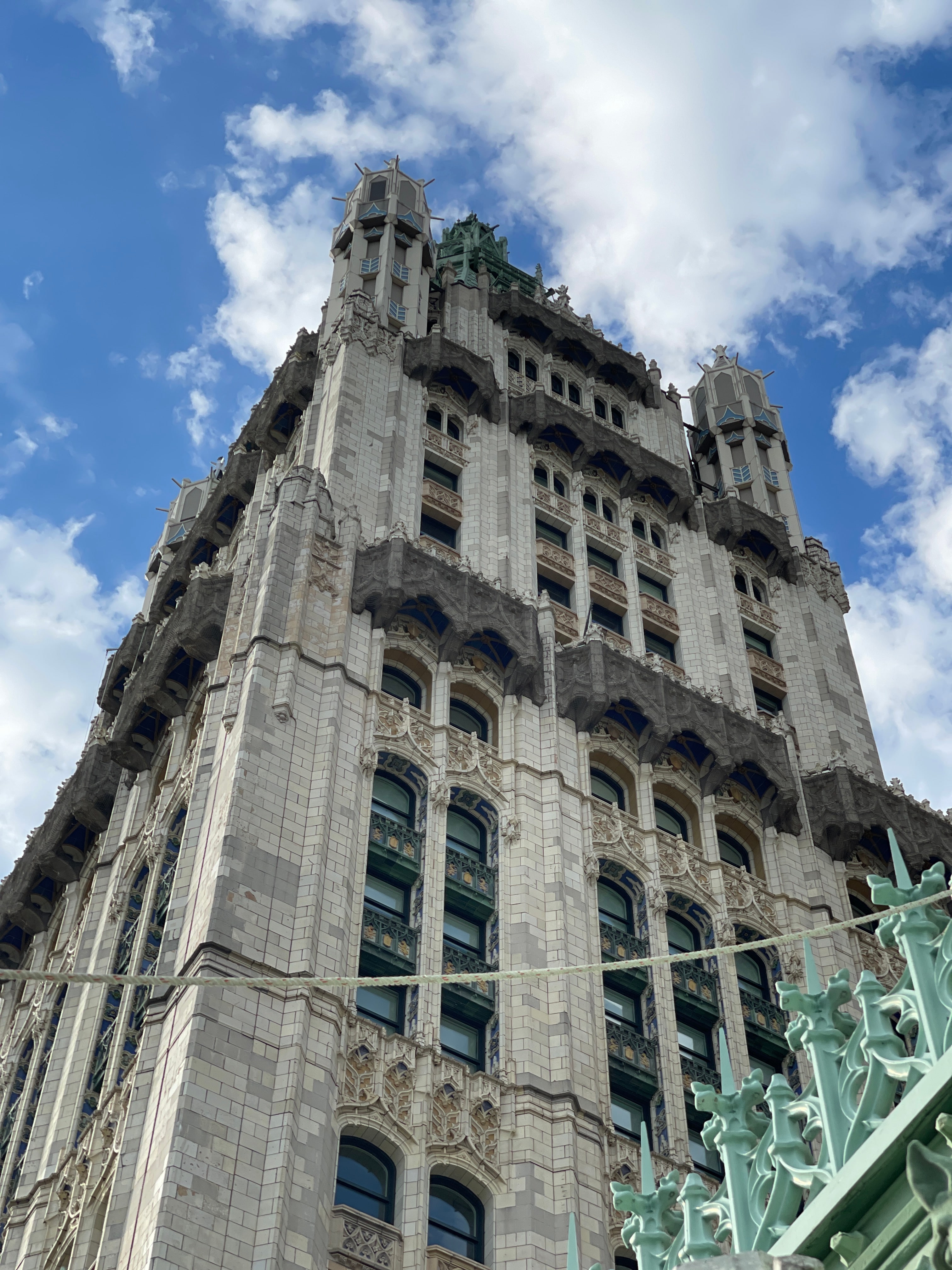 Woolworth Building tower and Gothic ornament viewed upward from scaffold level